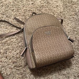 slightly used Guess mini backpack